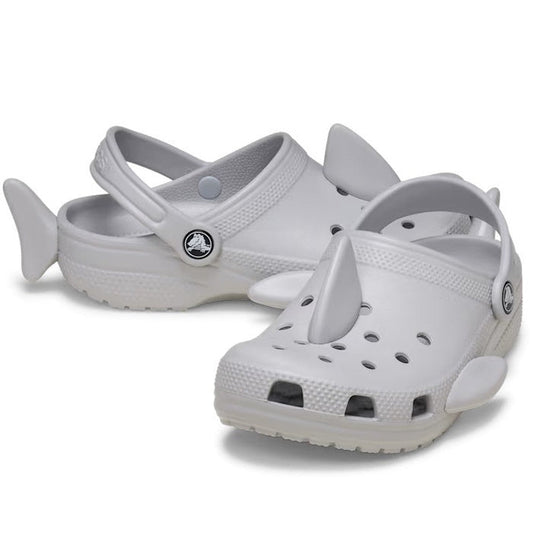 Crocs Kids Fun Lab I Am Shark clogs: white slip-ons with fun shark fins, comfy cushioned sole, breathable holes, and secure heel strap.  ksnz