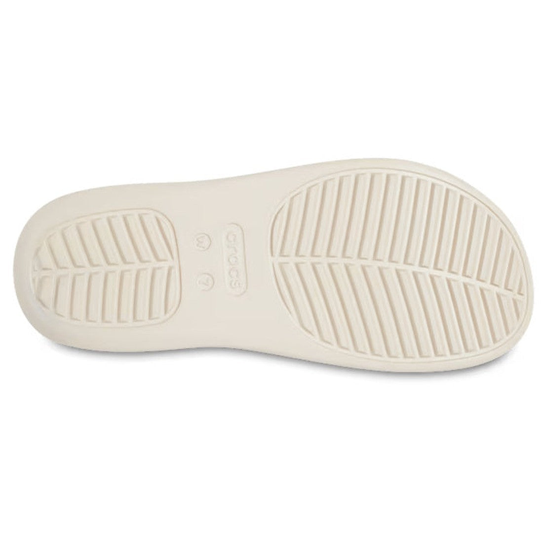 The image shows the sole of the Crocs - Womens Getaway Glitter Strappy Flip Flop Sandals in Stucco, with a textured non-slip tread featuring diagonal and horizontal grooves for grip. The Crocs logo appears at the center of the sole., 41764, 196265541591, 