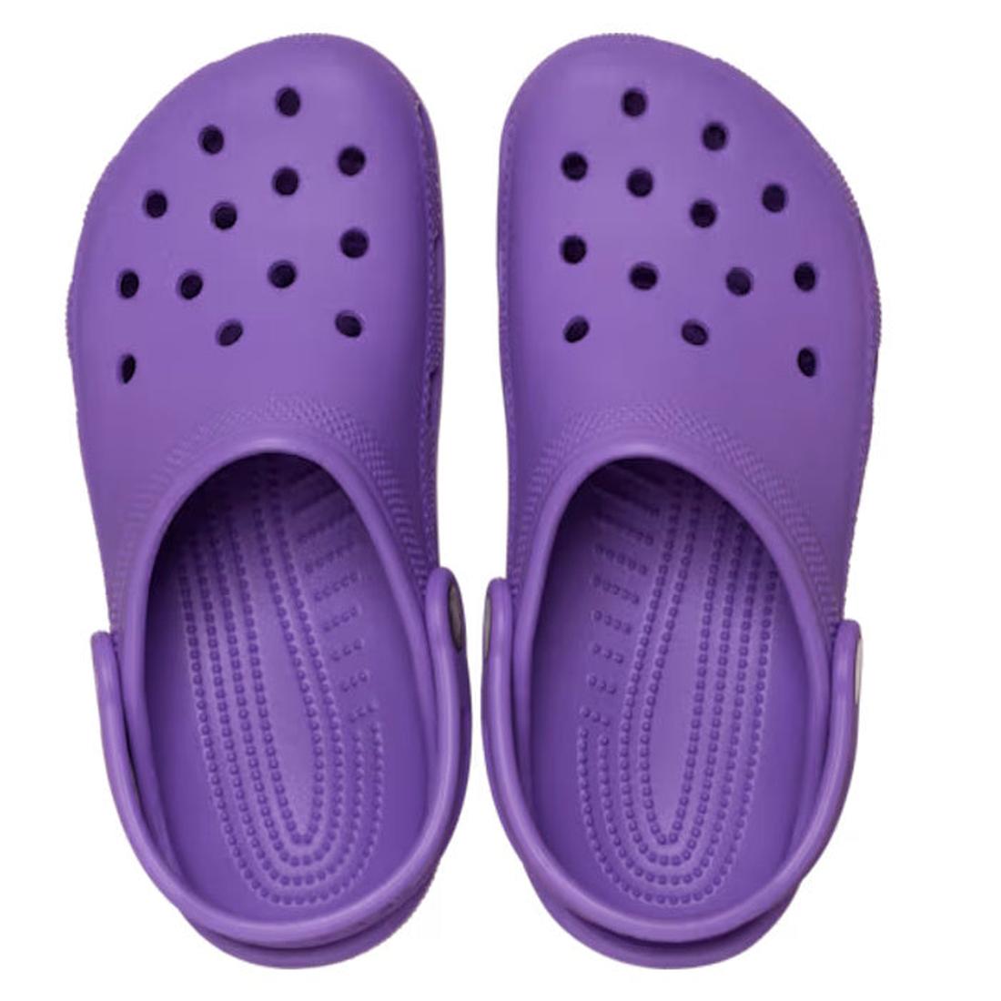 These Crocs Kids Classic Clog in purple, available in junior youth sizes, feature ventilation holes and adjustable back straps; they are water-friendly clogs shown from above on a white background., 198445337628, 198445337635, 198445337642, 198445337659, 