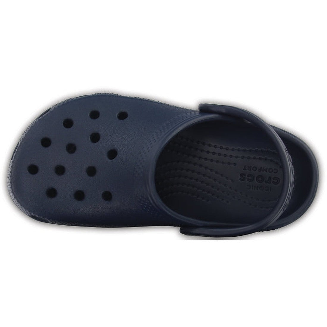 Top view of the Crocs Kids - Classic Clog K Navy Youths: a single navy clog with ventilation holes, pivoting heel strap, textured insole dots, and “Iconic Crocs Comfort” embossed—highlighting its lightweight Croslite material., 191448735002, 191448735019,