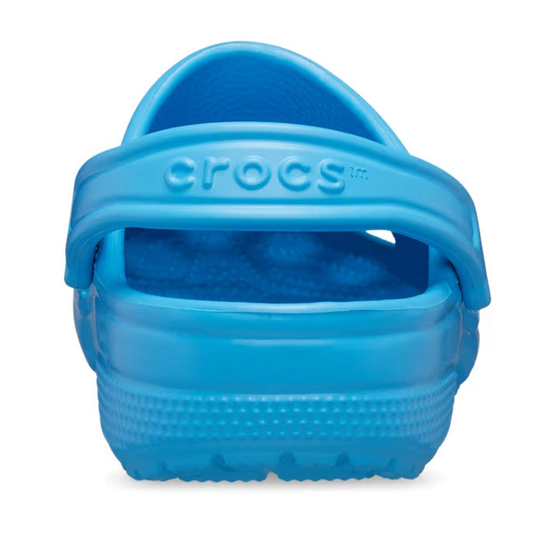 A close-up of the Crocs - Classic Clog Venetian Blue Adults shows the heel strap with "crocs" embossed, highlighting its unisex design and durable rubber-like construction., 196265799879, 196265799886, 196265799893, 196265799909, 196265799916, 19626579992