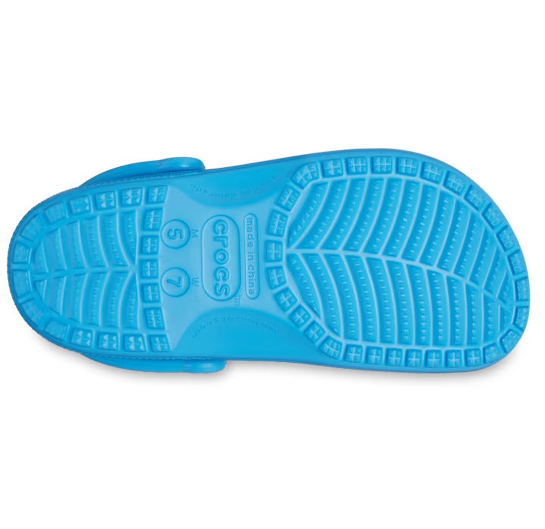 The treaded sole of the Crocs - Classic Clog Venetian Blue Adults, shown from below, features size markings and textured patterns for grip., 196265799879, 196265799886, 196265799893, 196265799909, 196265799916, 196265799923, 196265799794, 39527, 39528