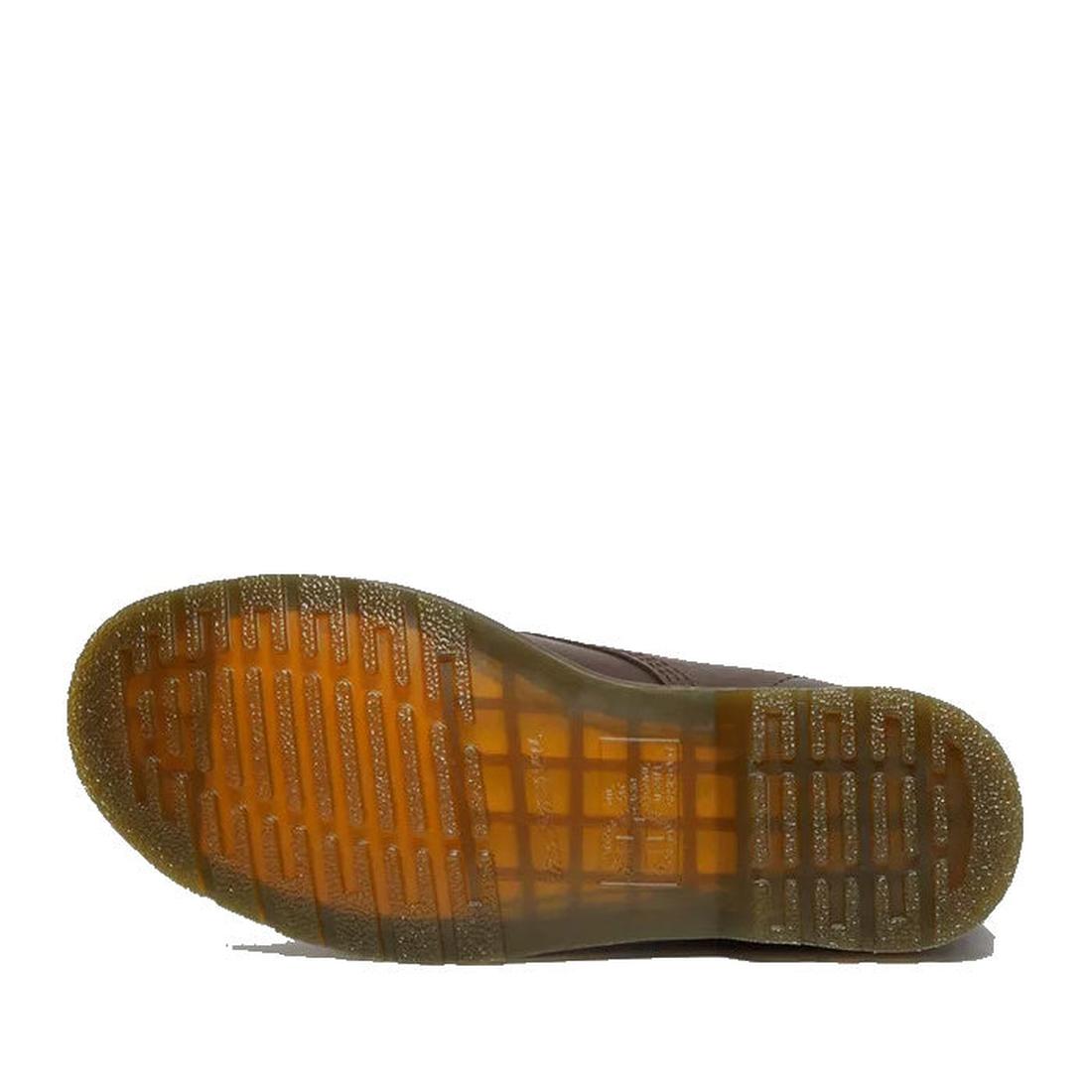 Brown shoe sole of Dr Martens 101 6 eye boots on a white background.,
190665488418,
190665488425,
190665488449,
190665488456,
190665488463,, 46217, 46218, 190665488418, 190665488425, 190665488449, 190665488456, 190665488463, 46226, 46227