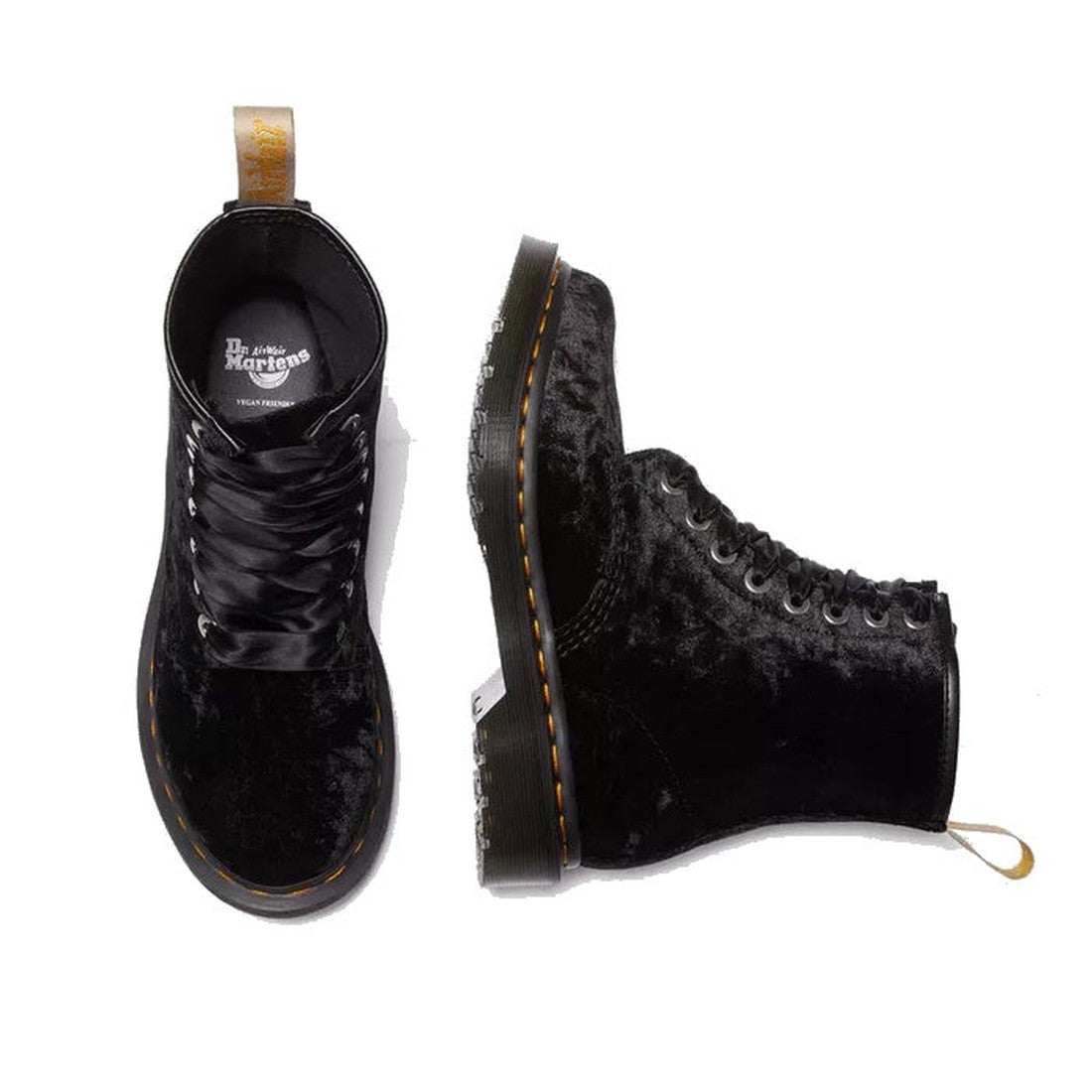 A pair of Dr. Martens 1460 Vegan Black Crushed Velvet 8 Eye Boots with yellow stitching; one boot stands upright showing the side, while the other lies flat to display the top view and laces., 190665580938, 190665580945, 190665580952, 190665580969, 190665