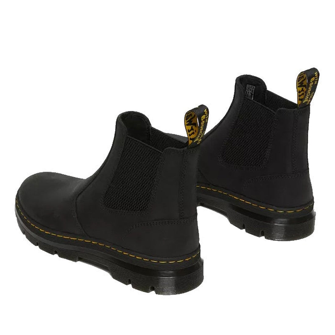 rear view of both feet of Dr Martens Embury in Black pull on chelsea boots showing the pull on tab on the heel and the yellow stitching around the sole. Also in veiw is the elastic gusset on the innner and outer sides of the ankle.,
190665358766,
19066535