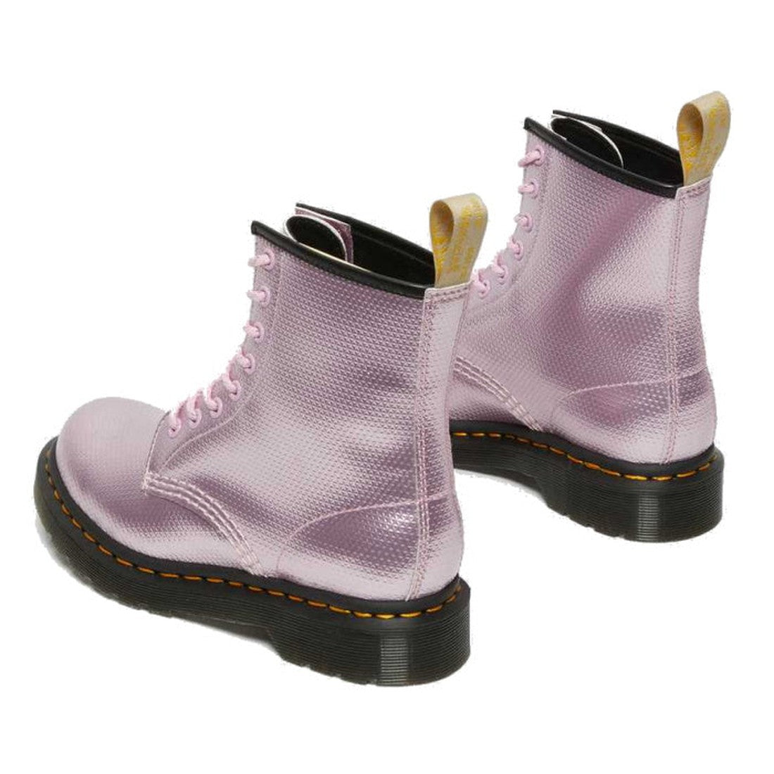 A pair of Dr Martens Vegan 1460 Pink Lavender Alumix Hex Emboss boots with black soles, yellow stitching, and yellow pull tabs are displayed on a white background., 190665418767, 190665418774, 190665418781, 190665418798, 190665418804, 190665418811, 190665