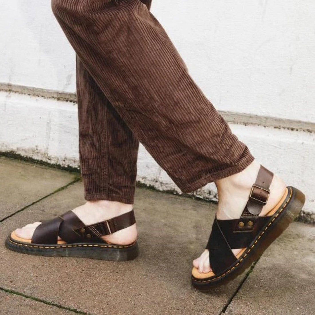 A child strolls in comfy bracken brown cords and Dr Martens Zane Brown Brando Leather Sandals, with sturdy sole and back strap, on a sunny walk.  ksnz, 190665643893, 190665643916, 190665643923, 190665643930, 190665643954