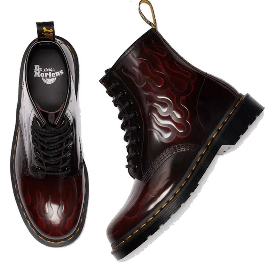 Dr. Martens inferno 1460 boots in shiny red  with embossed flame pattern. Right foot top down and left foot side view showing pull tab on geel and yellew stitching around the sole on a white background.,
190665743081,
190665743098,
190665743104,
190665743