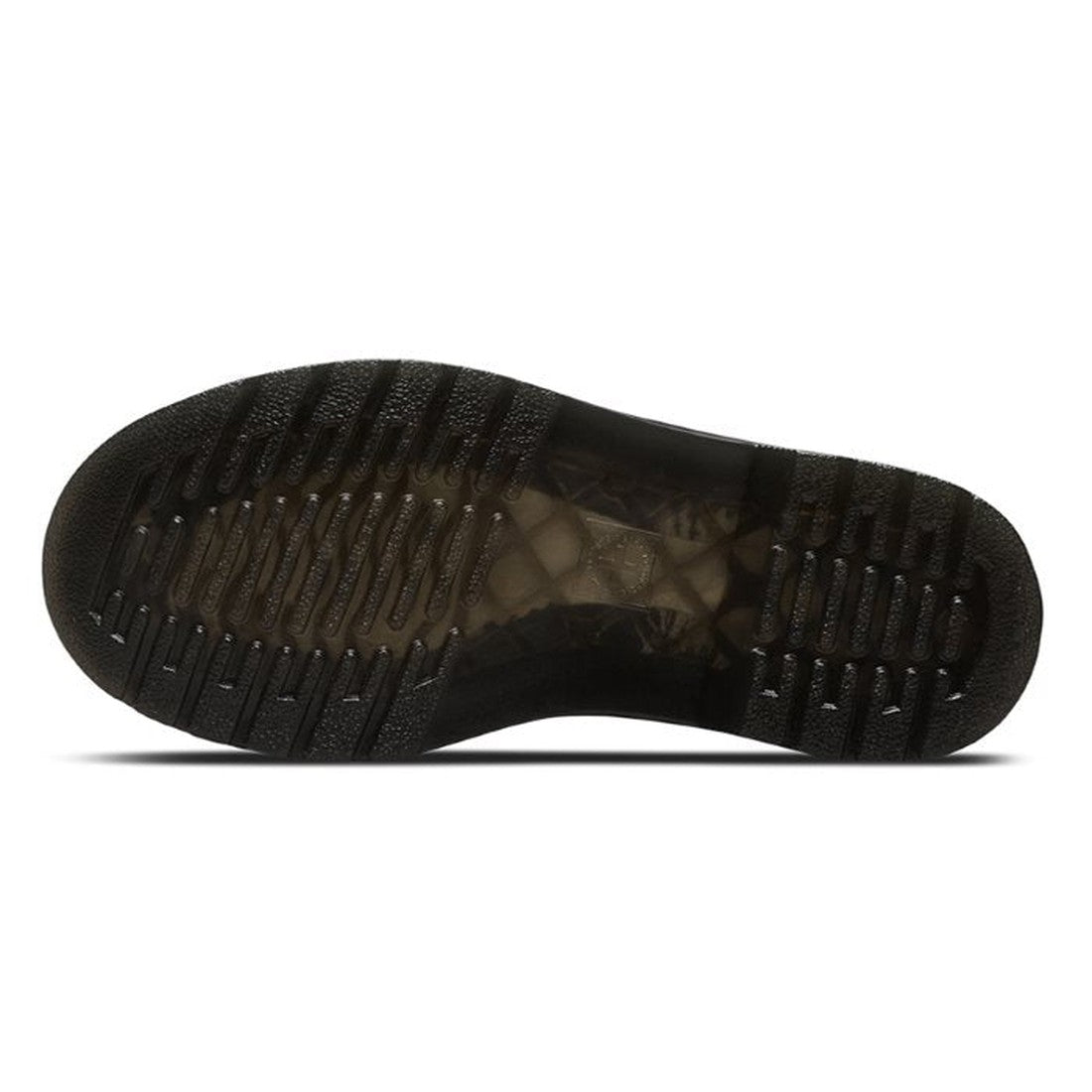 The image shows the underside of a Dr Martens Kids Kamron II Mono Velcro Junior Black School Shoe (UK10-3) with a black translucent rubber sole featuring a textured, ribbed tread for grip and flexibility., 190665681185, 190665681208, 190665681222, 1906656