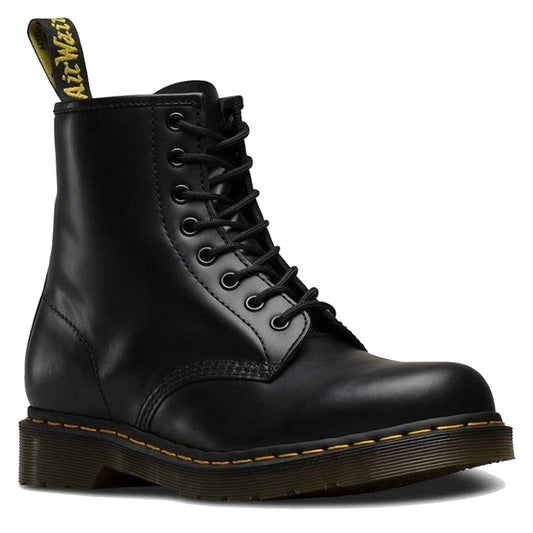 The 1460 Dr Martens Smooth Black Leather DMC 8 Up Boot features black leather, yellow stitching on the sole, and a black pull tab with yellow text—an iconic 8-eye lace-up boot.