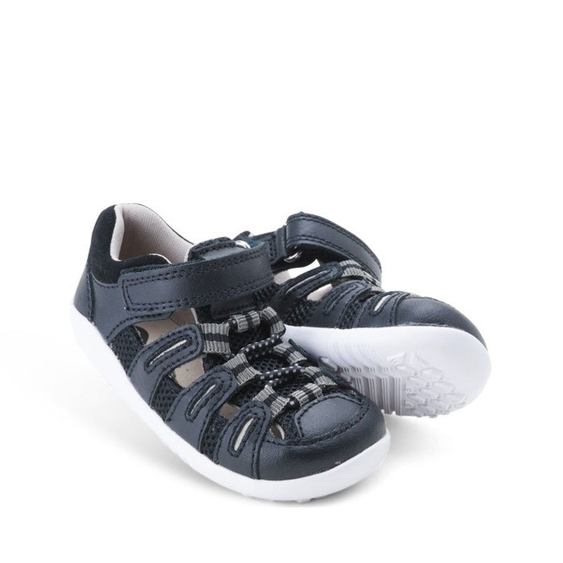 Bobux Step Up Summit Black Sandals for kids, featuring closed toes, comfy mesh sides, sturdy white soles, and easy hook-and-loop straps.  ksnz