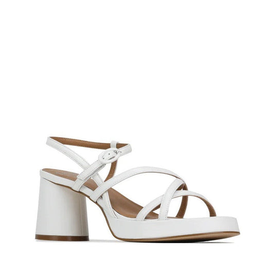 The EOS Womens Doriano Strappy Leather Sandal in White features multiple thin straps, a buckle ankle strap, and a chunky mid block heel with a slight platform—stylish and perfect for any occasion.