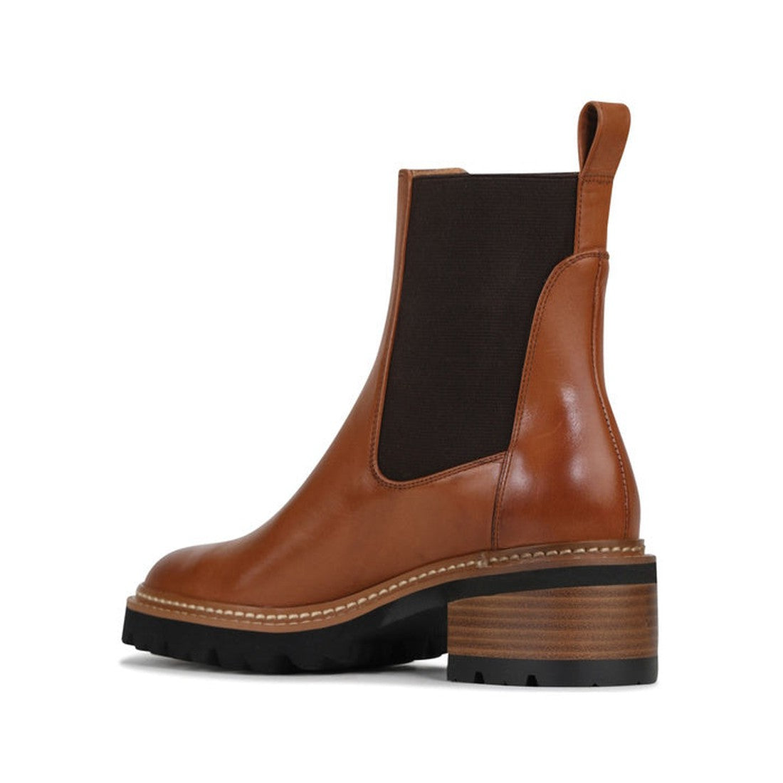 29612,
29613,
29614,
29615,
29616,
29617,

EOS Linear women’s boot in Brandy leather with side gussets, block heel, and lugged sole. Side View of Right Foot taken from the heel showing heel detailing on the inside of the leg, 29612, 29613, 29614, 29615, 2