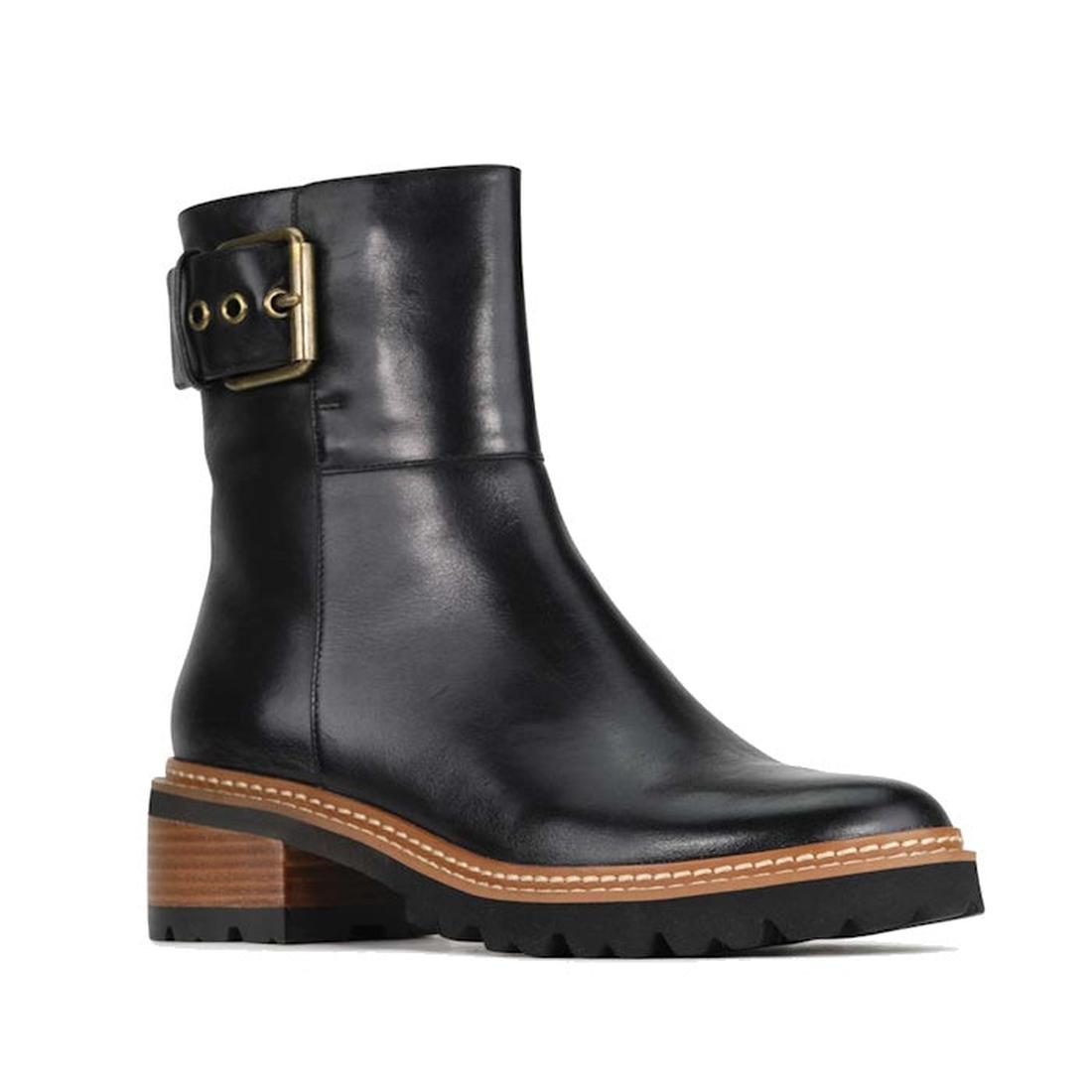 EOS Lineman Black Women's Leather Boot: sturdy lace-up combat boot with chunky heel, durable treaded sole, and shiny gold buckle.  ksnz