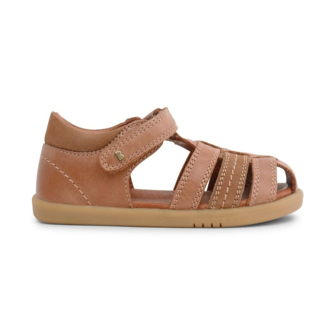 The Bobux IWalk Roam Sandal Caramel Closed Toe 626015A is a brown leather toddler sandal with a closed heel and toe, adjustable ankle strap, and multiple stitched top straps, pictured in side profile on a white background., 9420062047422, 9420062047439, 9