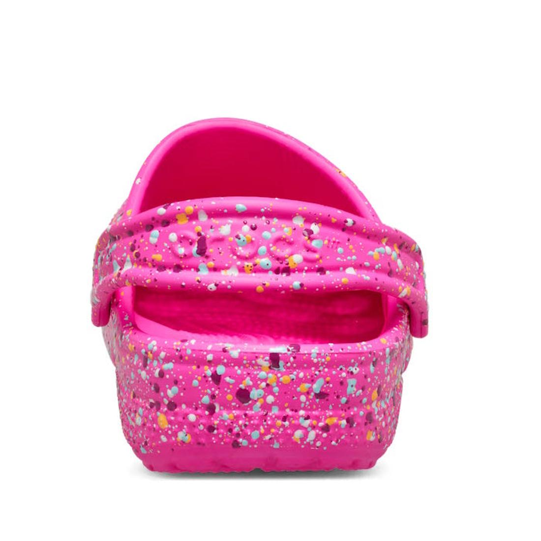 The Crocs Kids Youths Classic Clog K in Paint Splatter Print Bright Pink Multi features a vibrant pink base with colorful splashes and a matching heel strap—ideal for kids wanting fun, youthful clogs., 198445210228, 198445210235, 198445210242, 19844521025