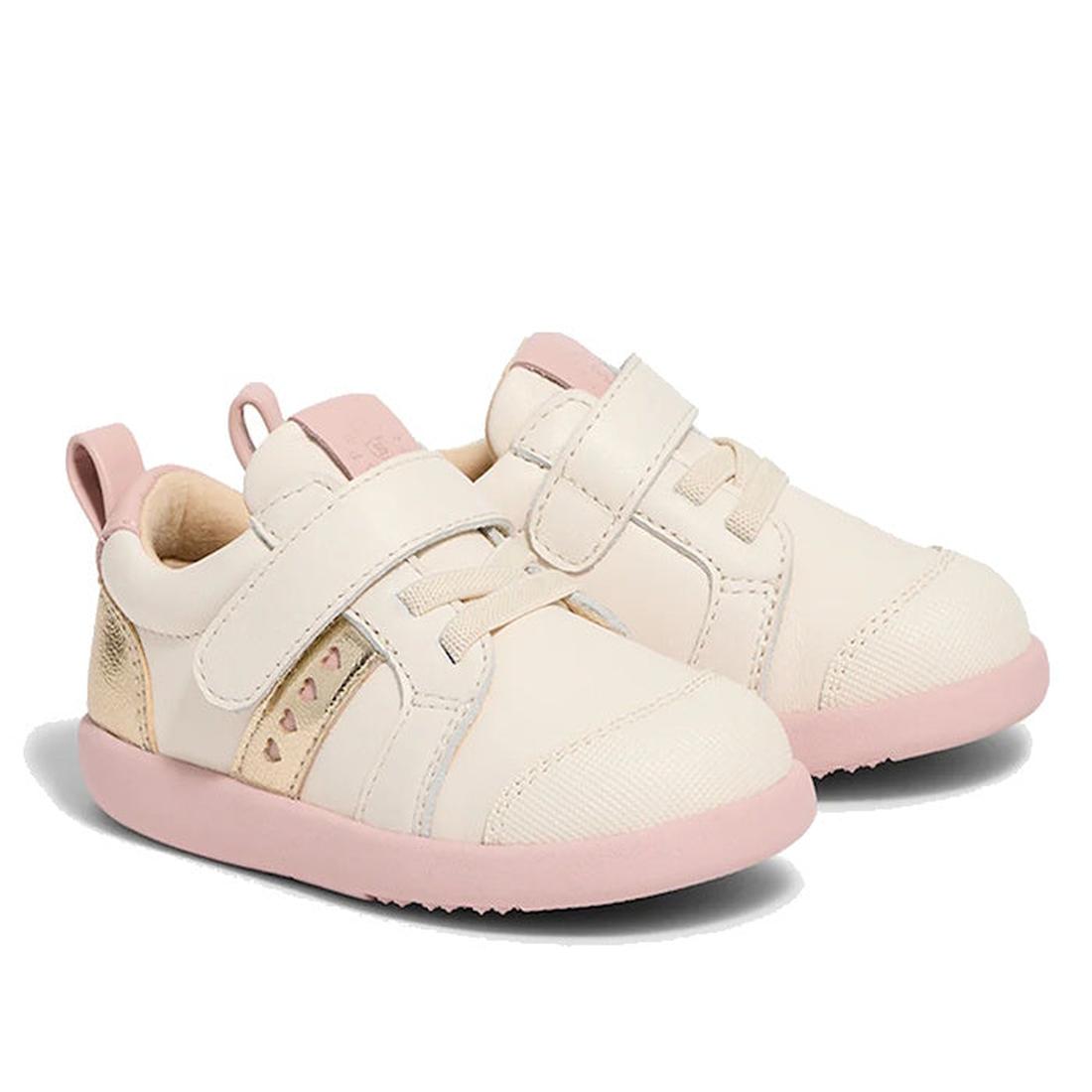 The Pretty Brave SID Leather Trainer First Walker in Off White Stone Pink are toddler shoes with cream uppers, light pink soles, Velcro straps, elastic laces, and gold and pink heart accents on the sides., 9420075362963, 9420075362956, 9420075362949, 9420