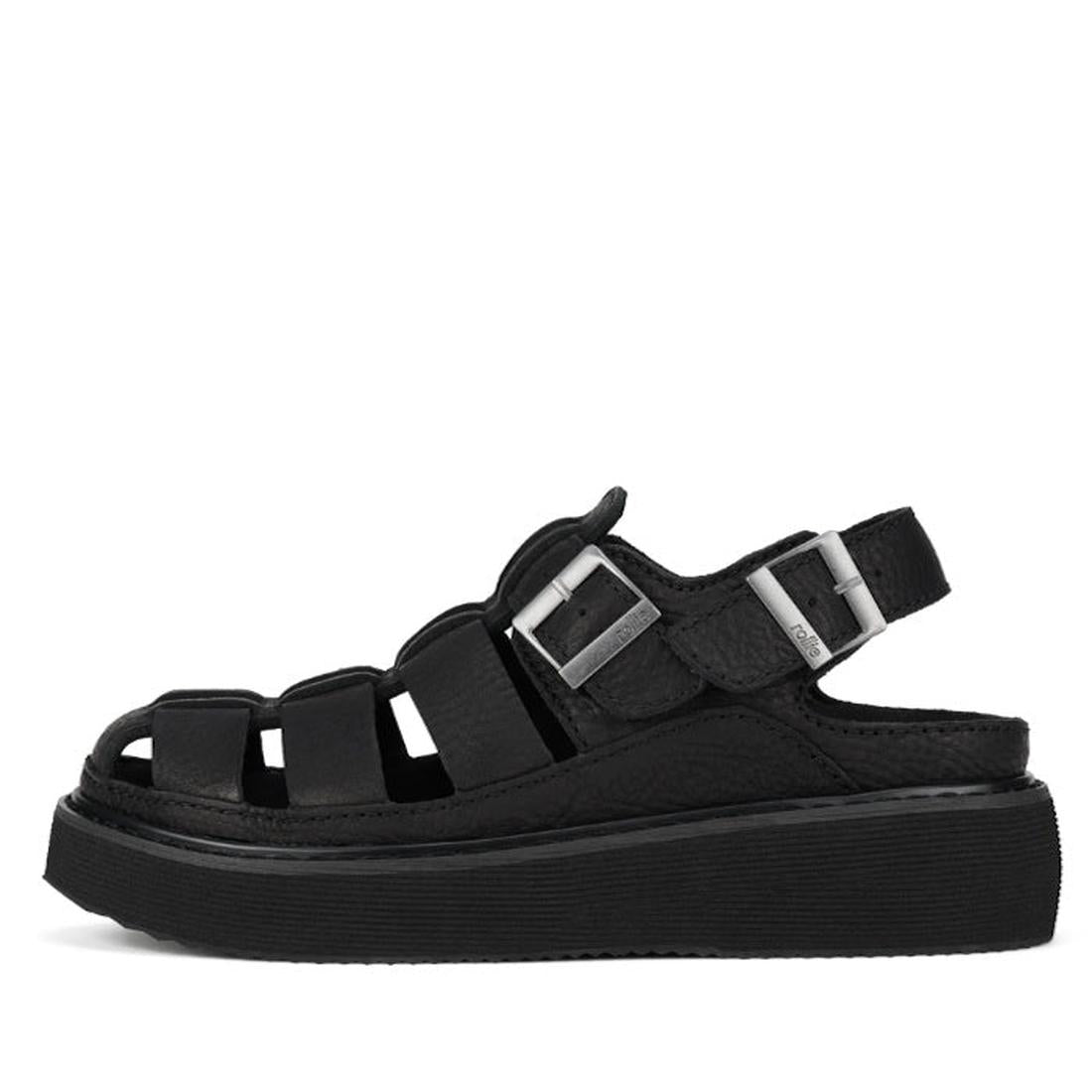 Rollie Hyde Fisherman Black sandal side view showing buckles around heel and over the top of the foot with buckle straps on a white background.,
9781760788858,
9781760788865,
9781760788872,
9781760788889,
9781760788896,, 46056, 9781760788858, 978176078886