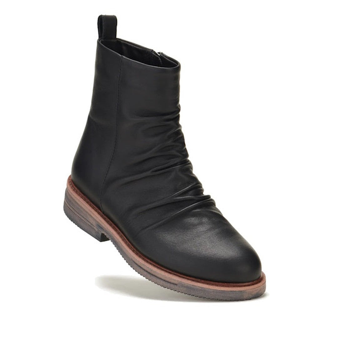 The Rollie Womens Ankle Black Leather Boot Side Zip Rise Artisan features a metal side zip, slight ruching on the upper, a brown stacked sole, and a low heel, shown against a white background.
