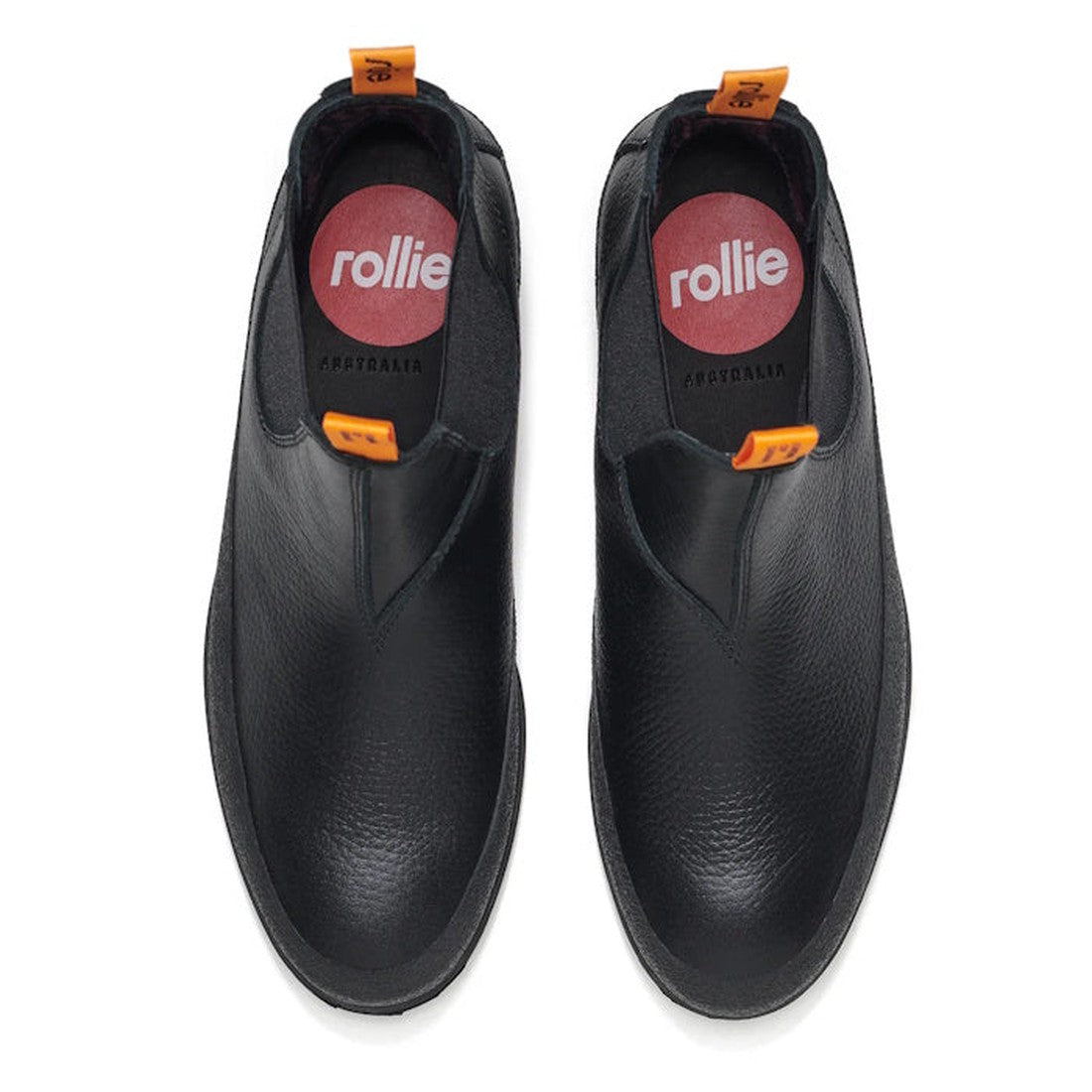 Rollie Womens Fields Chelsea Boots in black, with sturdy rubber soles, orange pull tabs, and comfy red insoles with white branding.  ksnz