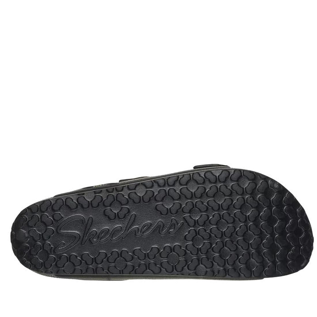 The image shows the black rubber sole of the Skechers Womens Arch Fit Foamies Cali Breeze Gold Star Slide, featuring raised clover shapes and an embossed Skechers logo—ideal for those wanting cushioned footbed sandals., 49587, 197627436340, 197627436357, 