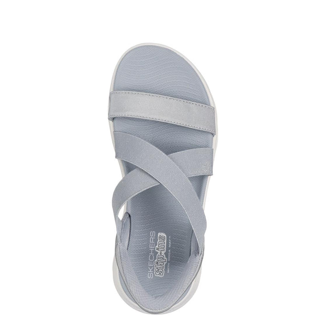 Top view of a Skechers Womens Slip Ins Sandals Go Walk Flex Glimmer Up in grey, featuring crisscross elastic straps, open toe design, and Arch Fit insole for comfort. Shown on a white background., 41550, 41551, 197976616745, 41553, 197976616752, 41555, 19