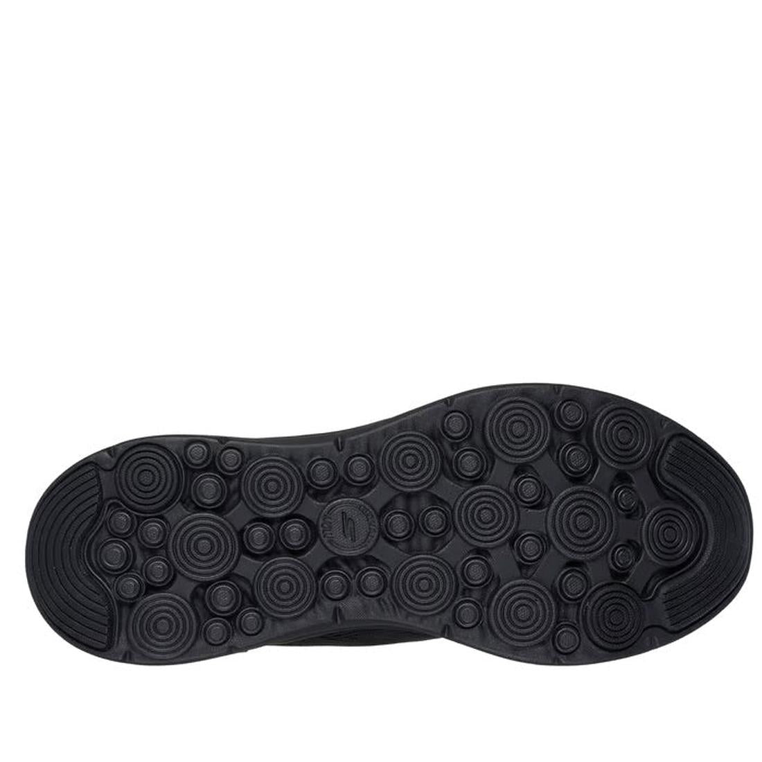The image shows the black rubber outsole of the Skechers Womens Slip Ins Go Walk Now Khloe, featuring raised circular treads, reinforced heel and toe for extra grip, and ULTRA LIGHT cushioning for all-day comfort., 49289, 198376580186, 198376580209, 19837