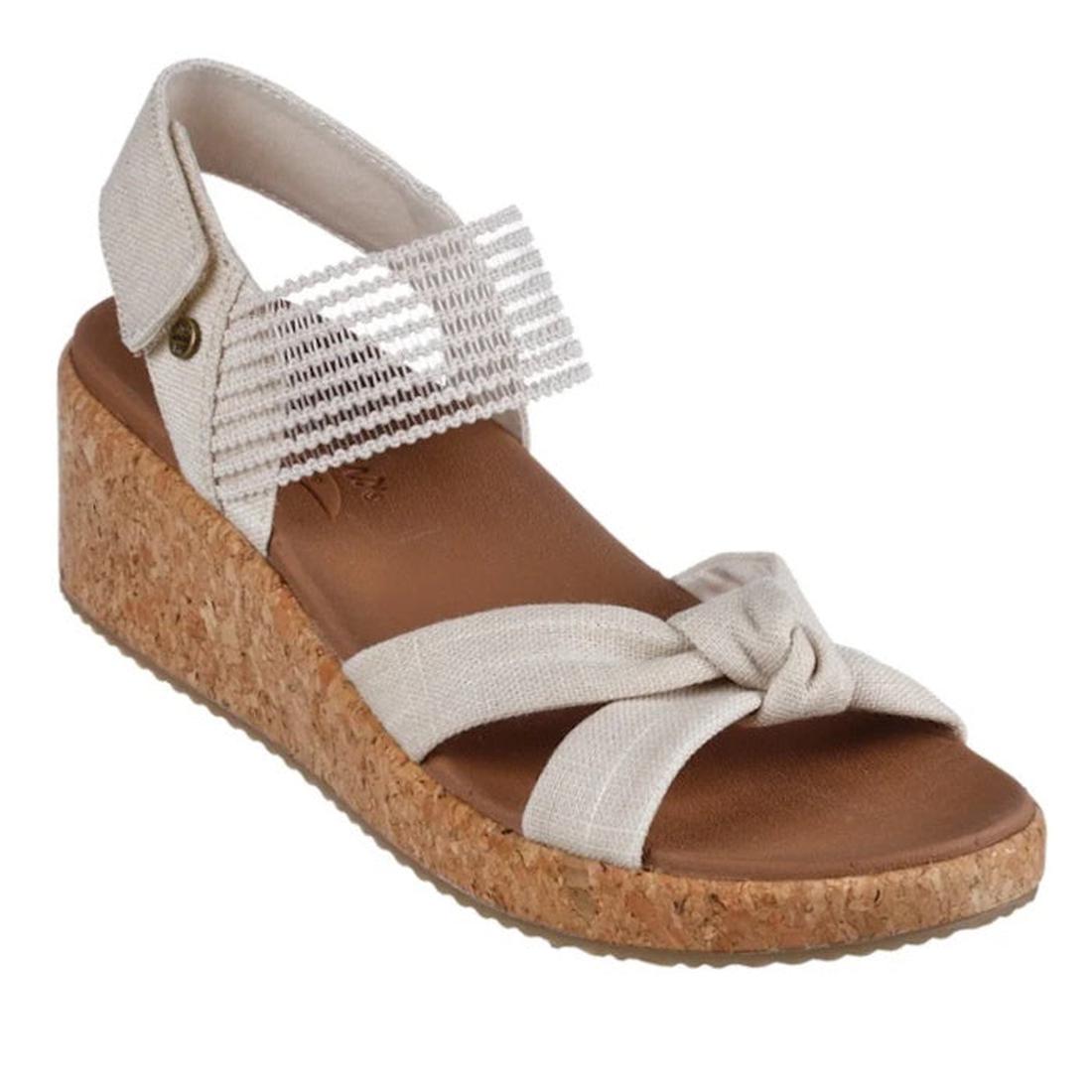 Skechers Womens Arch Fit Beverlee Juliet Wedge Sandal in Natural offers soft beige straps, comfy memory foam, easy closure, and cork wedge.  ksnz