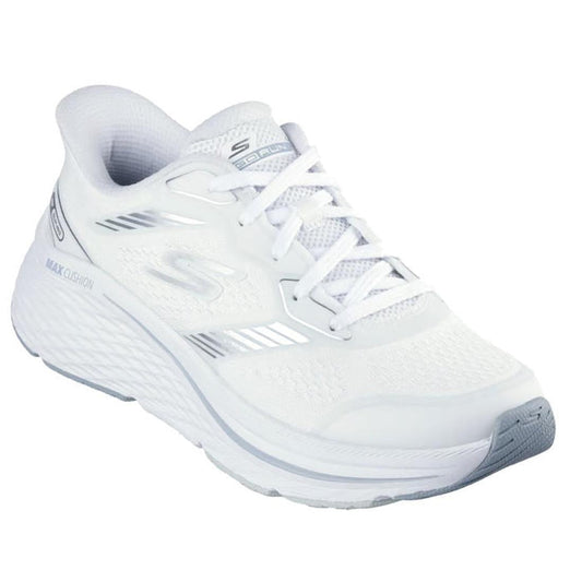 The Skechers Slip In Max Cushioning Elite 2.0 Leigh White Trainer features a mesh upper with silver accents, lace-up closure, thick cushioned sole, Air-Cooled Memory Foam, Skechers S logo on the side, and Max Cushioning Elite text near the heel.