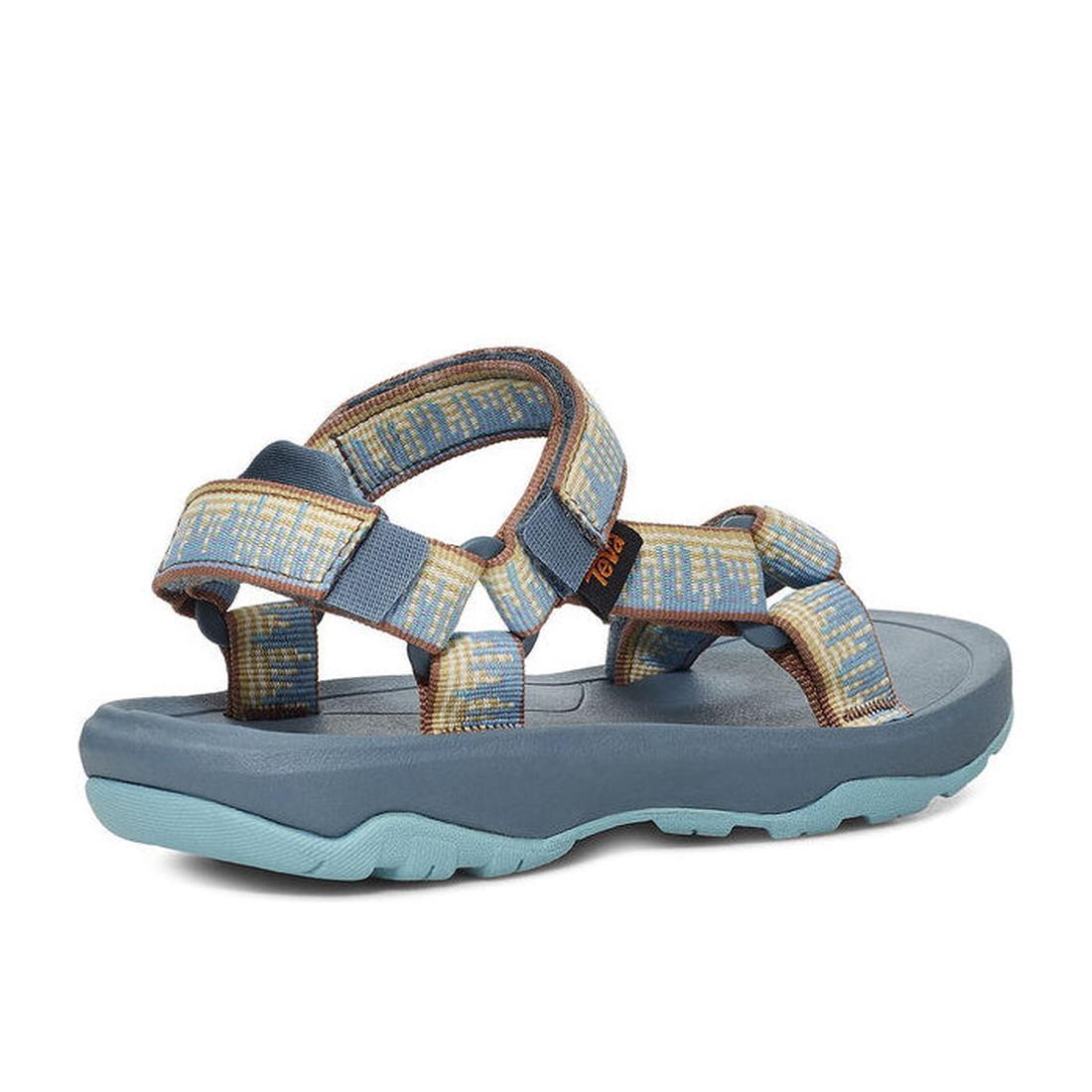 The Teva Kids Active Sandal K Hurricane XLT2 Blue features blue and tan adjustable recycled polyester straps, a thick cushioned sole, and textured tread—open-toe hiking sandals shown from the back and side on a white background., 24575, 195719339111, 1957