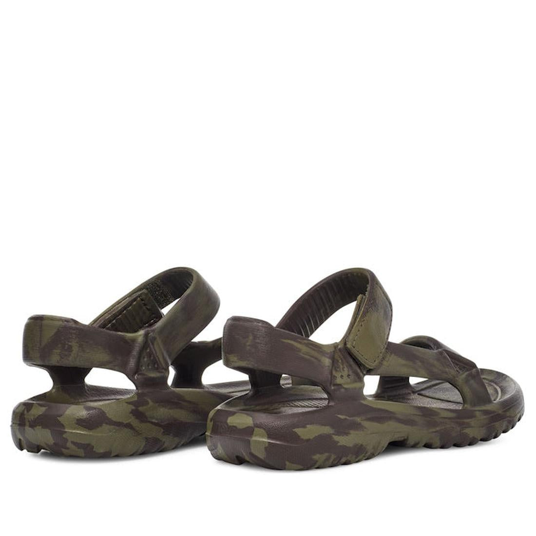 The Teva Kids K Hurricane Drift Huemix Olive Swirl are boys' waterproof sandals in a green and brown camouflage design, shown from the back and side. These lightweight EVA sandals have thick soles and adjustable ankle and foot straps., 196565118264, 19656