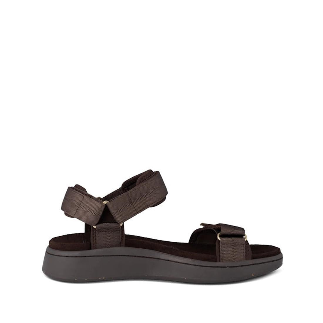 The Woden Line Women's 3 Strap Sandal in Chocolate Brown features adjustable straps over the toes and ankle, an open-toe design, and a thick cushioned sole with Natural Soft technology for all-day comfort and support., 48196, 5713326592511, 5713326592528,