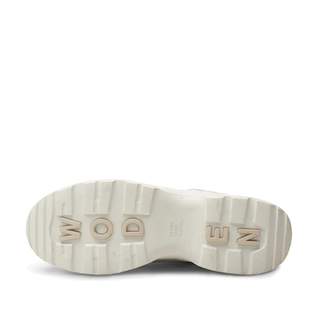 The image shows the chunky sole of the Woden SIF Reflective Women's Sneaker in Blanc de Blanc White, featuring raised, blocky "WODEN" lettering and deep grooves for traction. Made with recycled polyester for durability., 36107, 5713326428612, 571332642862