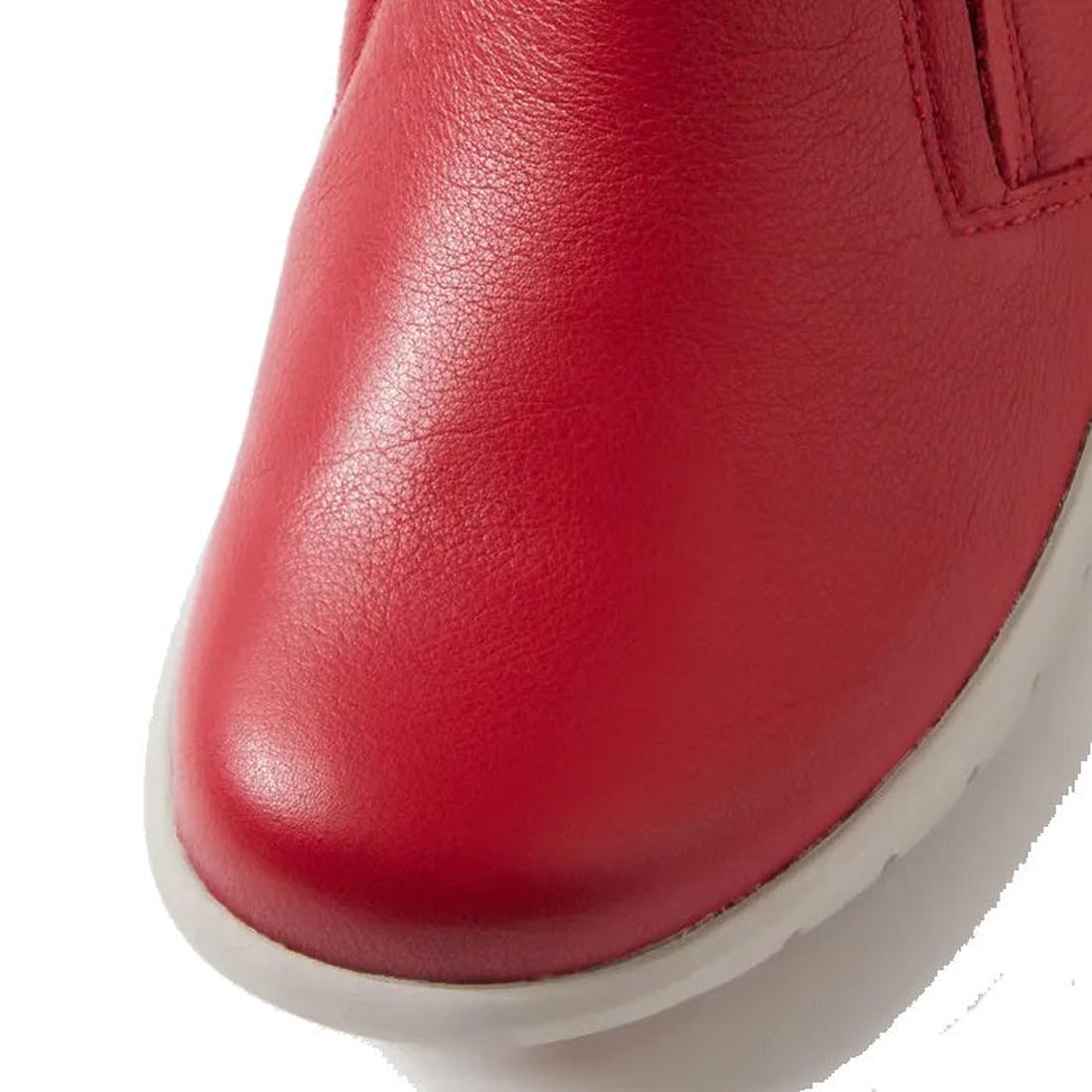 Close-up of the toe area of the Ziera Solange XF Leather Women's Ankle Boot in red, featuring textured leather and detailed stitching on a white sole—perfect for extra wide fit., 51061, 4434750236376, 4434750236390, 4434750236413, 4434750236437, 443475023